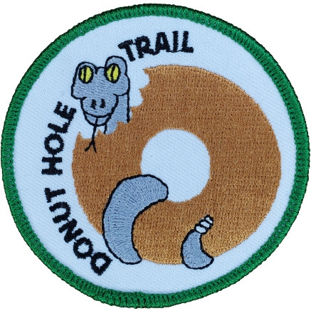 Product Description: Donut Hole Trail Patch</br>Round; 3"; cloth; four colors.</br> Donut Hole <br>Trail Patch