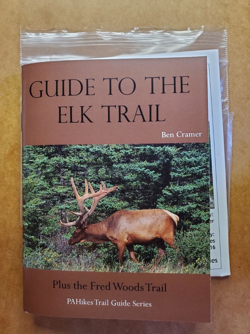 Product Description: The Guide to the Elk Trail is another in the PA Hikes series. This pocket-sized guide contains 55 pages describing the Elk Trail and the nearby Fred Woods Trail. Inside you’ll find turn-by-turn directions for this 15.6 mile segment trail near Benezette and information on local resources. Included is a 2-sided color map printed on water-resistant paper. (2016); 5.5” x 4.5”.</br> Elk Trail Guide Book